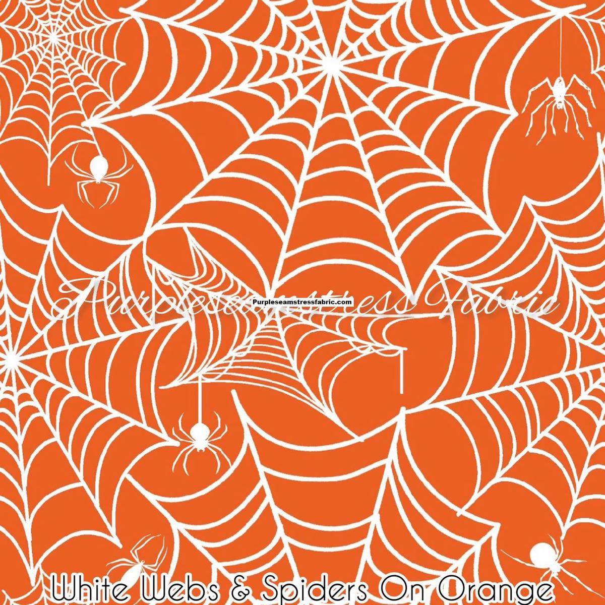 White Webs & Spiders on Orange  Fabric